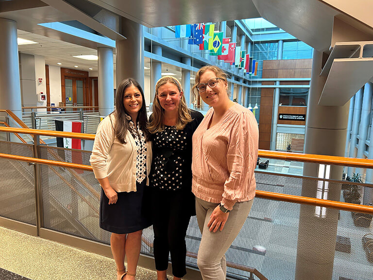 In the photo from left are Becca Polcz; Krista Ricci, president of the Indiana Chapter of Partners of the Americas, and Kyra Helming.