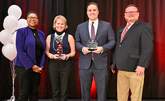Dean Karen Bravo with Kerry Hyatt Bennett, Michael Cunningham, and Jayme Little.