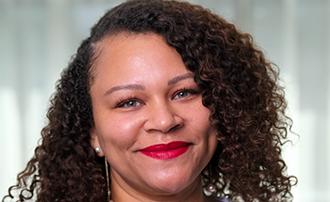 woman standing in front of a window