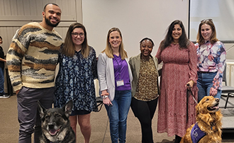 Students and service dogs at a JLAP event