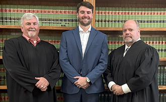 Judge Jeryl F. Leach, Braden Merriman, and Judge Patrick K. Ryan.