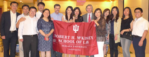 Professors Wilson and Page with alumni in China