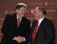 Photo of Fred Glass shaking hands with Michael A. McRobbie