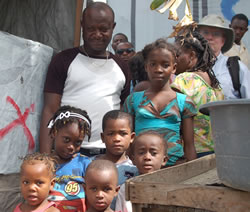 Professor Quigley with survivors of the earthquake in Haiti