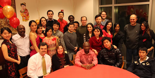A group of LL.M. students and faculty gather for the Lunar New Year celebration