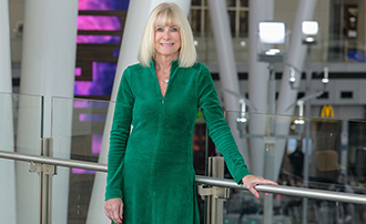 woman standing in an atrium