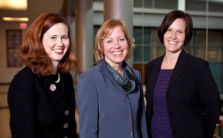 Photo of Director Cynthia Baker with Fellows Elliott McKinnis and Olivia Flemming